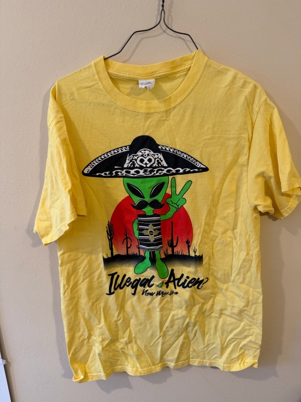 Vintage Yellow Graphic Tee with Green Alien and Sombrero